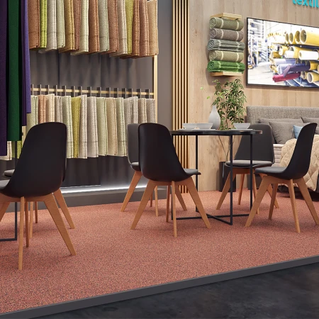 I prodotti tessili Heimtextilien per la casa sono presentati in un elegante stand espositivo. Il pavimento espositivo WARCO, coordinato per colore, è costituito da lastre a clip in granulato di gomma.