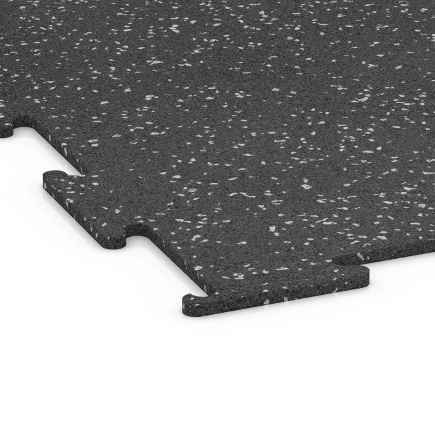 La vue détaillée sur les bords du produit WARCO 6452, Sol de Fitness Compact, au format 100 × 100 × 0,8 cm, en couleur Gris doux moucheté.