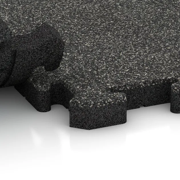 Großaufnahme vom Verbindungssystem von WARCO-Boden 2848 - Piastra antitrauma ad incastro puzzle im Farbdesign Granito scuro. Abmessungen 500 x 500 x 40 mm.