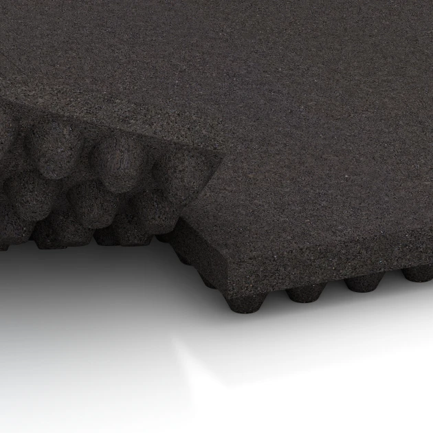 Le gros plan sur le système de connexion des revêtements de sol WARCO 3643 - Tapis d’écurie de luxe en couleur Anthracite. Les dimensions 100 × 50 × 5,5 cm.