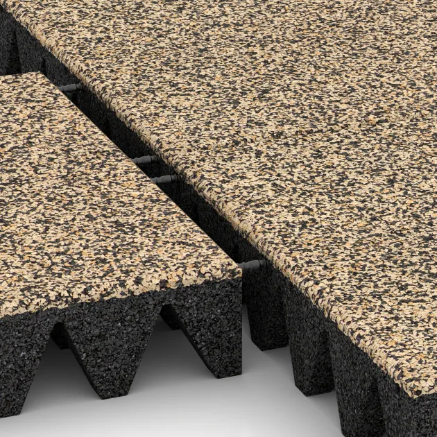 Le gros plan sur le système de connexion des revêtements de sol WARCO 3699 - Dalle amortissante en couleur Travertin. Les dimensions 500 x 500 x 100 mm.