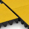 Großaufnahme vom Verbindungssystem von WARCO-Boden 0740 - Piastra antitrauma im Farbdesign Giallo limone. Abmessungen 500 x 500 x 100 mm.