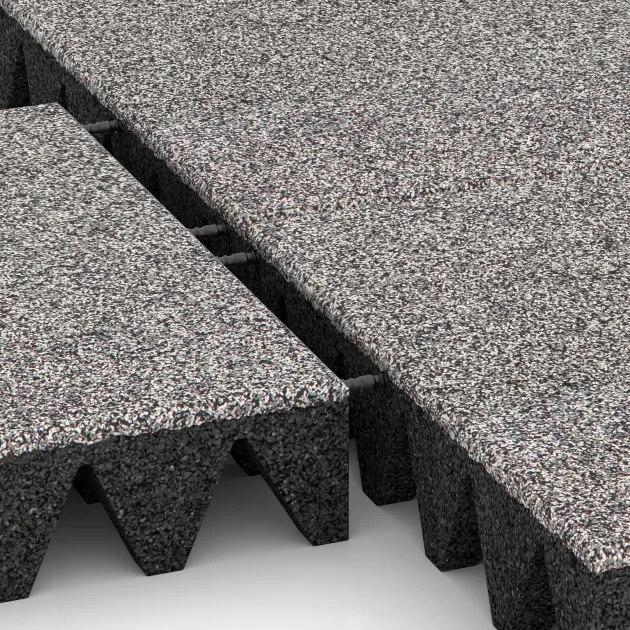 Großaufnahme vom Verbindungssystem von WARCO-Boden 4476 - Piastra antitrauma im Farbdesign Grigio melange. Abmessungen 500 x 500 x 100 mm.