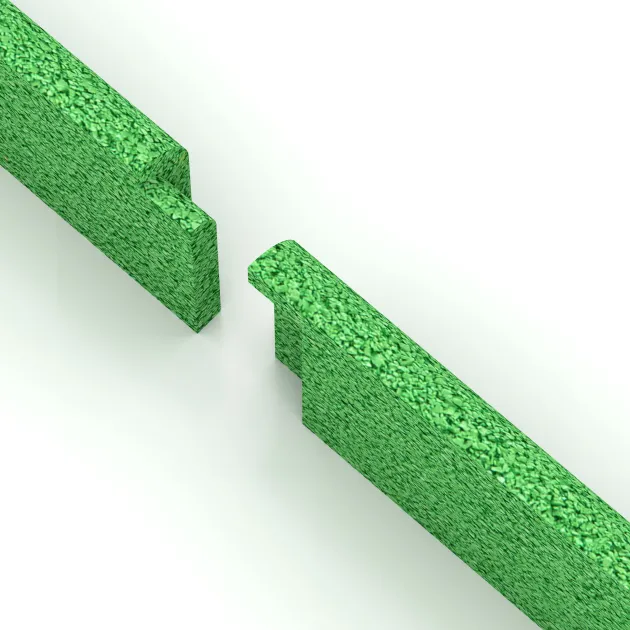 Großaufnahme vom Verbindungssystem von WARCO-Boden 4289 - Battiscopa im Farbdesign Verde Maggio. Abmessungen 750 x 80 x 20 mm.