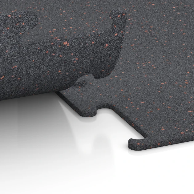 Großaufnahme vom Verbindungssystem von WARCO-Boden 3753 - Pavimentazione Fitness Performance Elite im Farbdesign Rosso leggermente punteggiato. Abmessungen 100 x 100 x 1 cm | 1,00 m².