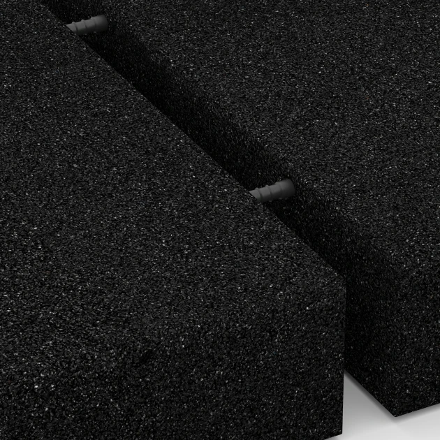 Großaufnahme vom Verbindungssystem von WARCO-Boden 6174 - Piastrelle antitrauma im Farbdesign Antracite. Abmessungen 50 x 50 x 11 cm.