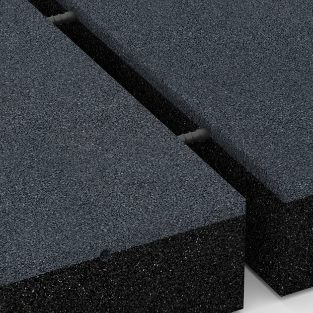 Großaufnahme vom Verbindungssystem von WARCO-Boden 6230 - Piastrelle antitrauma im Farbdesign Grigio ardesia. Abmessungen 50 x 50 x 11 cm.