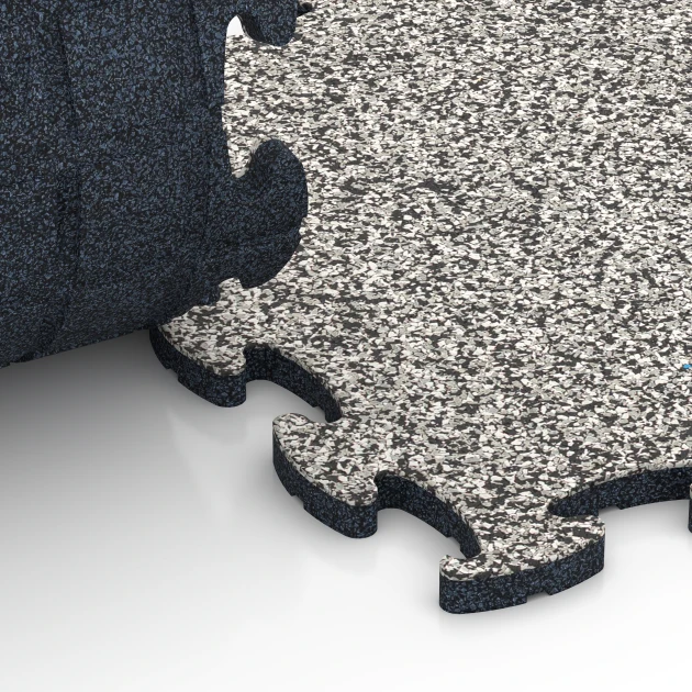 Le gros plan sur le système de connexion des revêtements de sol WARCO 6824 - Fitness Active dalle en couleur Granit gris. Les dimensions 44,6 x 44,6 x 1,8 cm.
