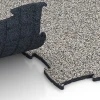 Le gros plan sur le système de connexion des revêtements de sol WARCO 6806 - Sol agility pour chiens en couleur Granit gris. Les dimensions 97,1 x 97,1 × 1,8 cm.