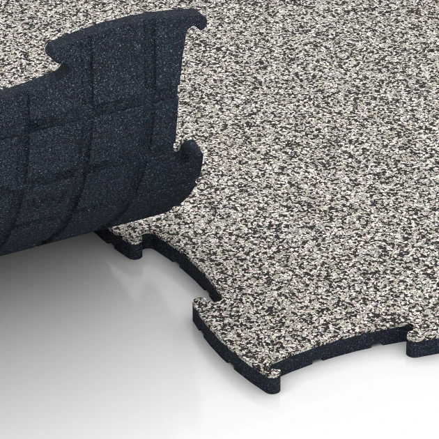 Le gros plan sur le système de connexion des revêtements de sol WARCO 6869 - Dalle Fitness Max en couleur Granit gris. Les dimensions 97,1 x 97,1 × 1,8 cm.
