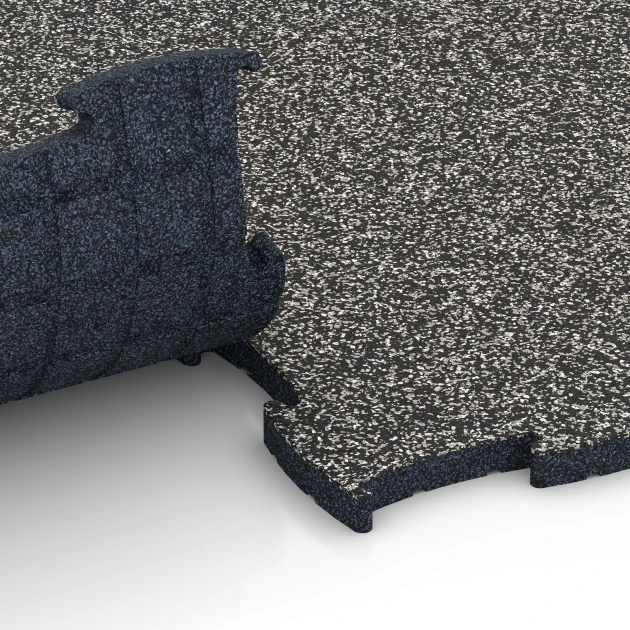 Le gros plan sur le système de connexion des revêtements de sol WARCO 6850 - Fitness Active dalle en couleur Granit gris foncé. Les dimensions 97,1 x 97,1 x 2,8 cm.