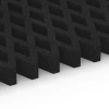 Großaufnahme vom Verbindungssystem von WARCO-Boden 7012 - Fallschutz-Rasengittermatte im Farbdesign Anthrazit. Abmessungen 100 × 100 × 8 cm.