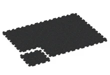 Dalle amortissante à emboîtement puzzle